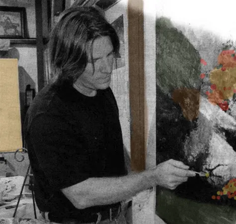 Robert A. Tino working on a painting